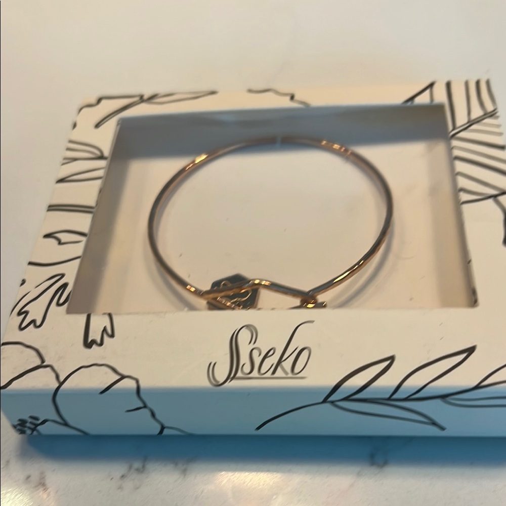 Sseko Rose Gold Brave Bracelet Africa charm